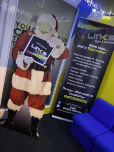 Merry Christmas! Meet Santa at the Links SIgns and Graphics office